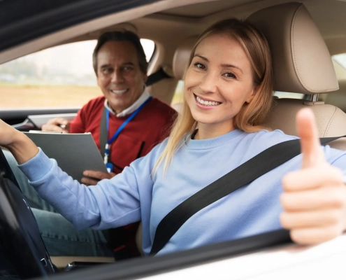 Driving instructor explaining road rules at AAA Car Driving School